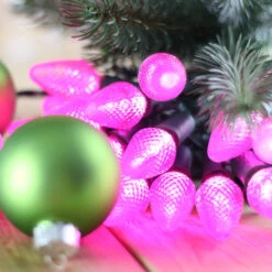 25-light C7 Pink LED Christmas Lights, 8" Spacing Green Wire 10 25-light C7 Pink LED Christmas Lights, 8" Spacing Green Wire -Decorative Lighting Store c7 pink led christmas light string 82818