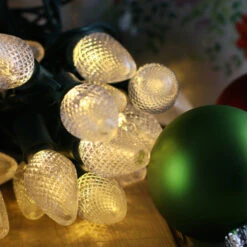 25-light C7 Warm White LED Christmas Lights, 8" Spacing Green Wire 11 25-light C7 Warm White LED Christmas Lights, 8" Spacing Green Wire -Decorative Lighting Store c7 warm white led christmas light 82818