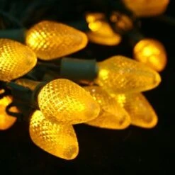 25-light C7 Yellow LED Christmas Lights, 8" Spacing Green Wire -Decorative Lighting Store c7 yellow led christmas lights