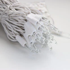 100-bulb Clear Mini Lights, 6" Spacing, White Wire -Decorative Lighting Store clear mini lights white wire a