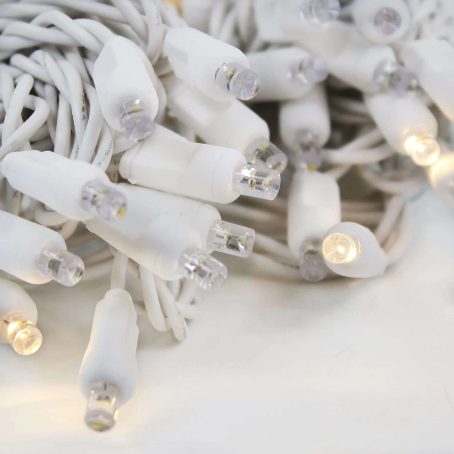 50-light 5mm Warm White Strobe LED Christmas Lights, 4" Spacing White Wire 3 50-light 5mm Warm White Strobe LED Christmas Lights, 4" Spacing White Wire