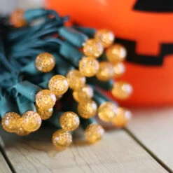 50-light G12 Orange LED Christmas Lights, 4" Spacing Green Wire -Decorative Lighting Store g12 orange led halloween light 82818