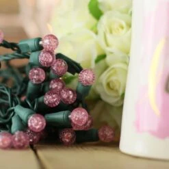 50-light G12 Pink LED Christmas Lights, 4" Spacing Green Wire -Decorative Lighting Store g12 pink LED christmas light 82818a