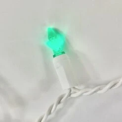 100-light M5 Green LED Icicle Lights, White Wire 11 100-light M5 Green LED Icicle Lights, White Wire -Decorative Lighting Store green led m5 icicle light white wire closeup