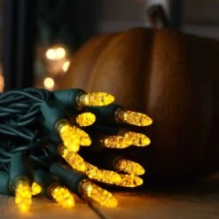 50-light M5 Yellow LED Christmas Lights, 4" Spacing Green Wire -Decorative Lighting Store m5 yellow led christmas light 82818a