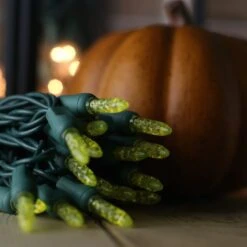 50-light M5 Yellow LED Christmas Lights, 4" Spacing Green Wire -Decorative Lighting Store m5 yellow led christmas tree light 82818