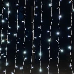 8-foot Twinkle LED Curtain Lights Pure White On White Wire -Decorative Lighting Store pure white twinkle curtain white wire z 5e435137 f5d5 4b6d a8af c81c5c9efc27