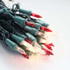 100-bulb Candy Cane (Red Clear Frost) Mini Lights, 4" Spacing, Green Wire -Decorative Lighting Store red clear white frost glass mini lights green wire b