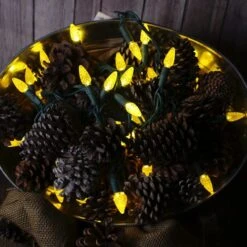 50-light C6 Yellow LED Christmas Lights, 4" Spacing Green Wire -Decorative Lighting Store yellow c6 led christmas lights a 7521