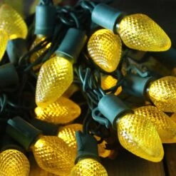 25-light C7 Yellow LED Christmas Lights, 8" Spacing Green Wire -Decorative Lighting Store yellow c7 led christmas lights 080518b