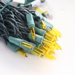100-bulb Yellow MiniLights, 4" Spacing, Green Wire -Decorative Lighting Store yellow mini lights green wire a